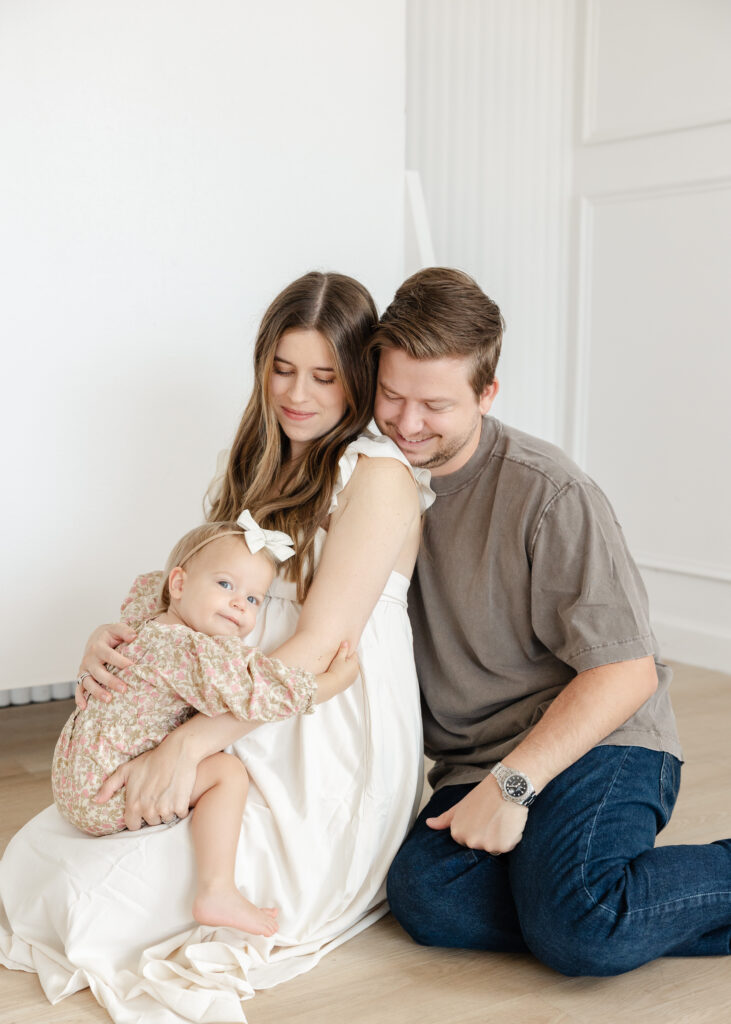 Mom & Dad cuddling their first baby before 2nd baby arrives! oklahoma maternity studio photographer